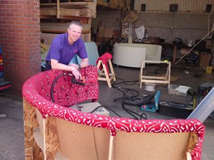 Image of Ian working on some seating.