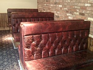 An image of deep buttoned seating.